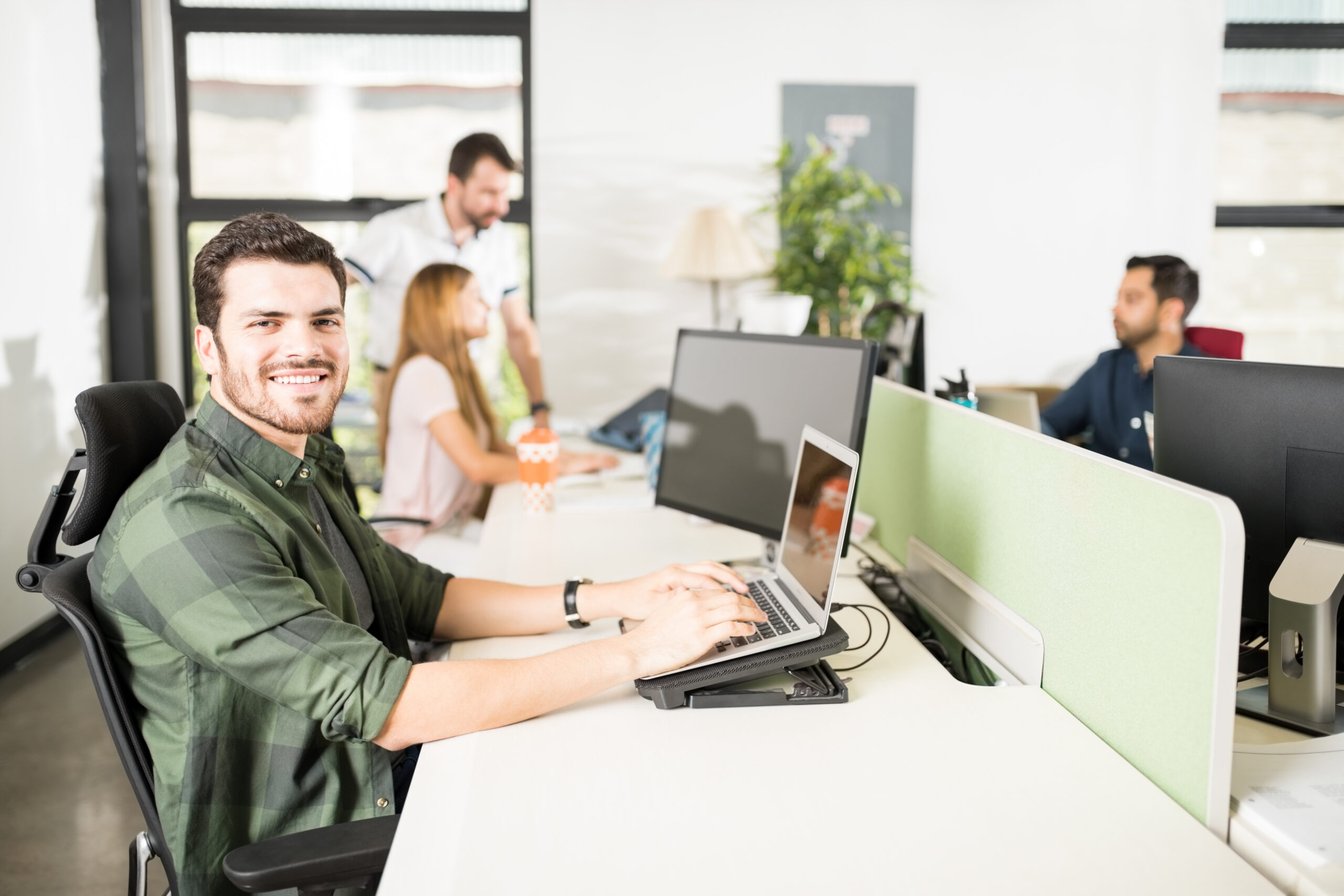 focus businessman making eye contact working his table office scaled